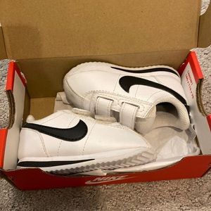 Toddler Nike shoes (the pair on the left)